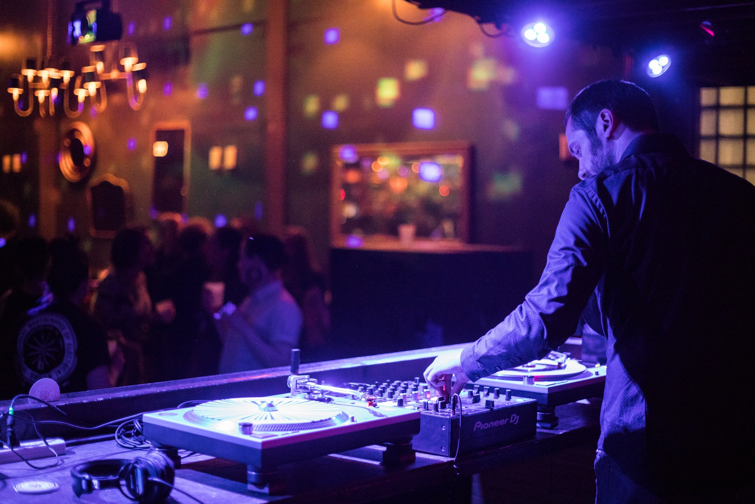 Mike Dutkewych of SOUL DEEP DJing with vinyl at an event